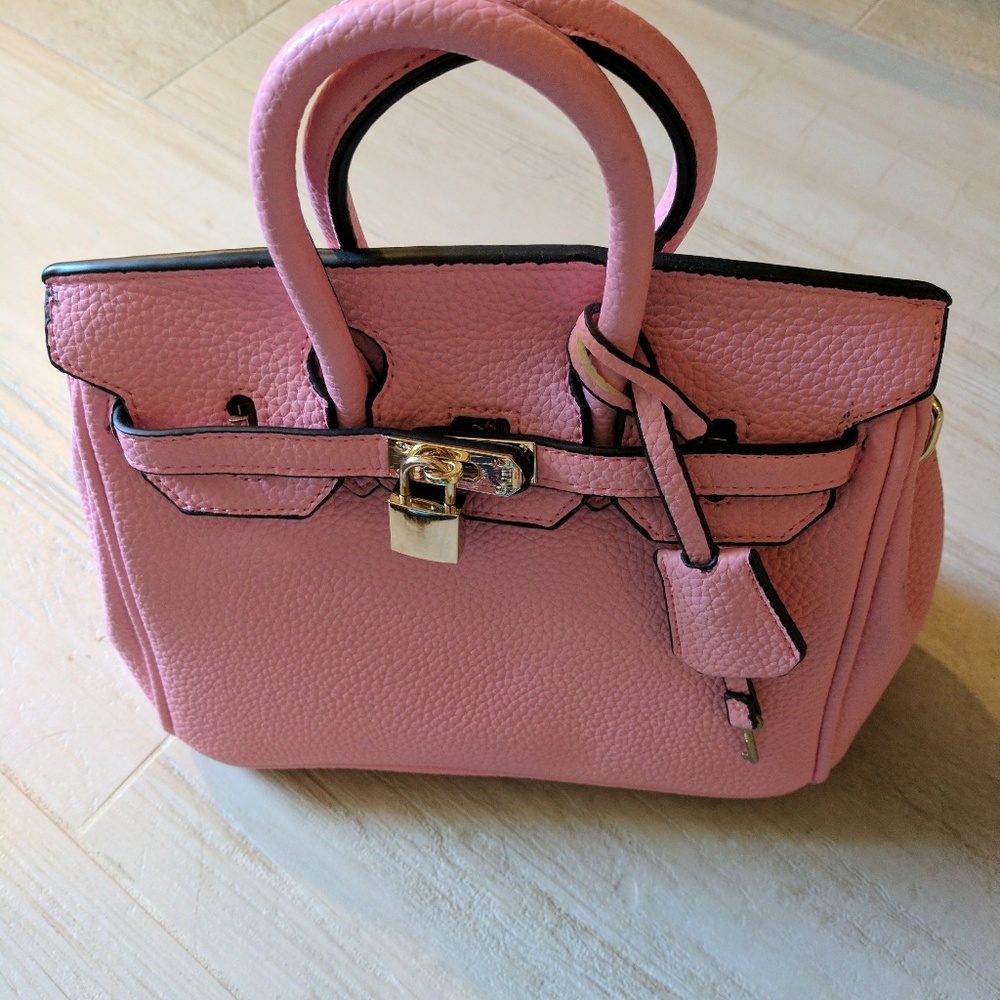 NWOT Pink purse with lock & key