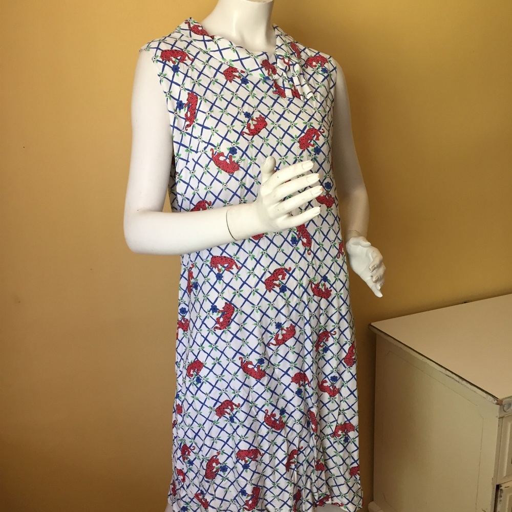 Vintage big cat in flowers dress