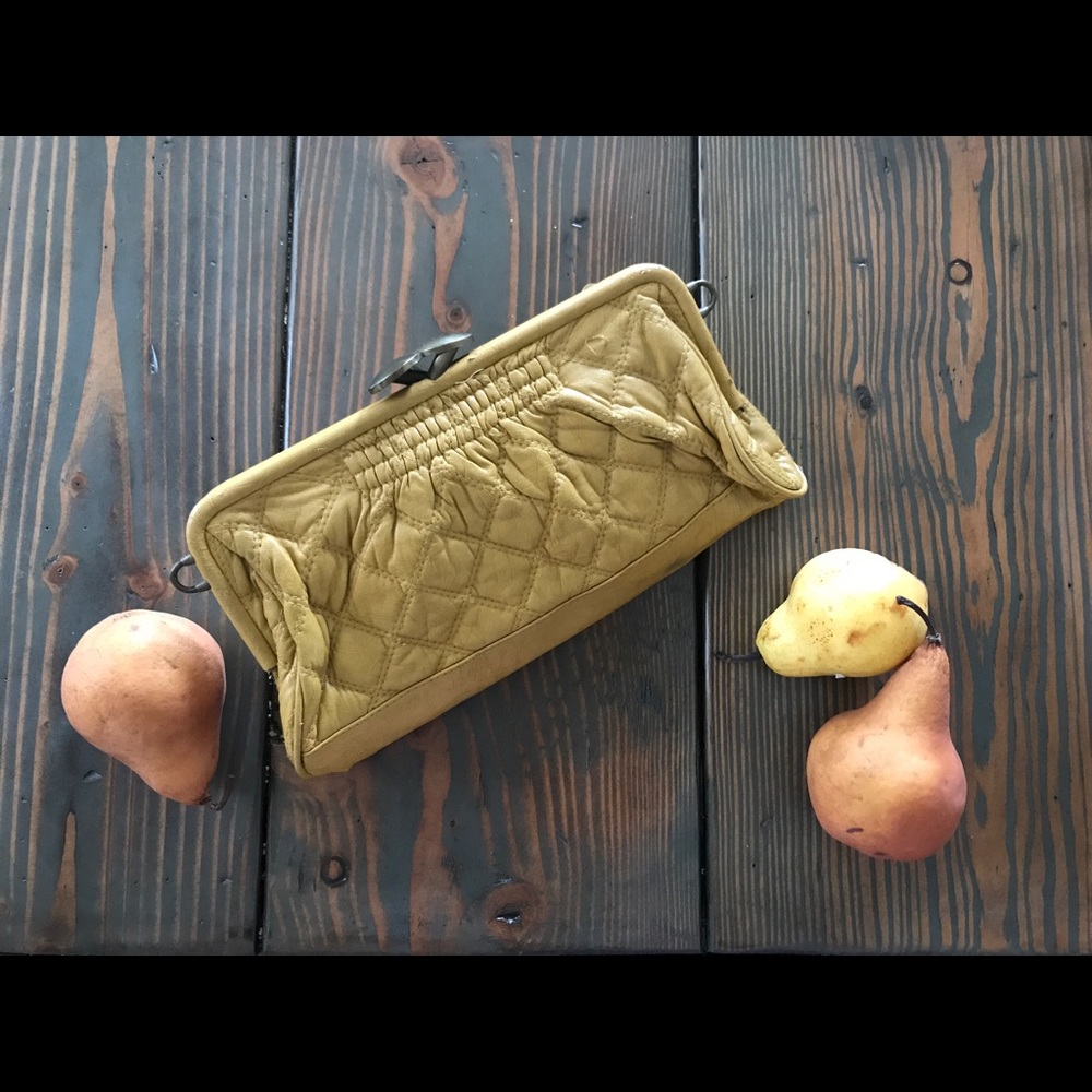 Mustard Aldo quilted clutch