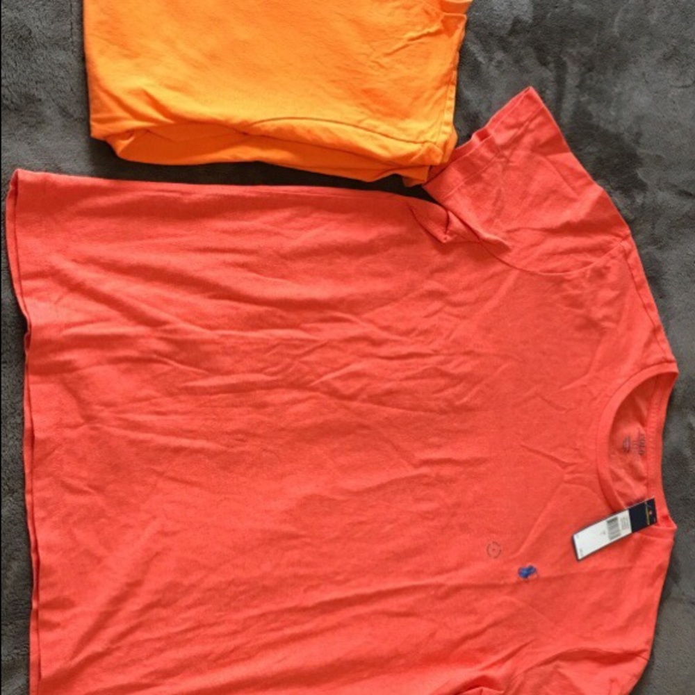 Two polo tshirts size large
