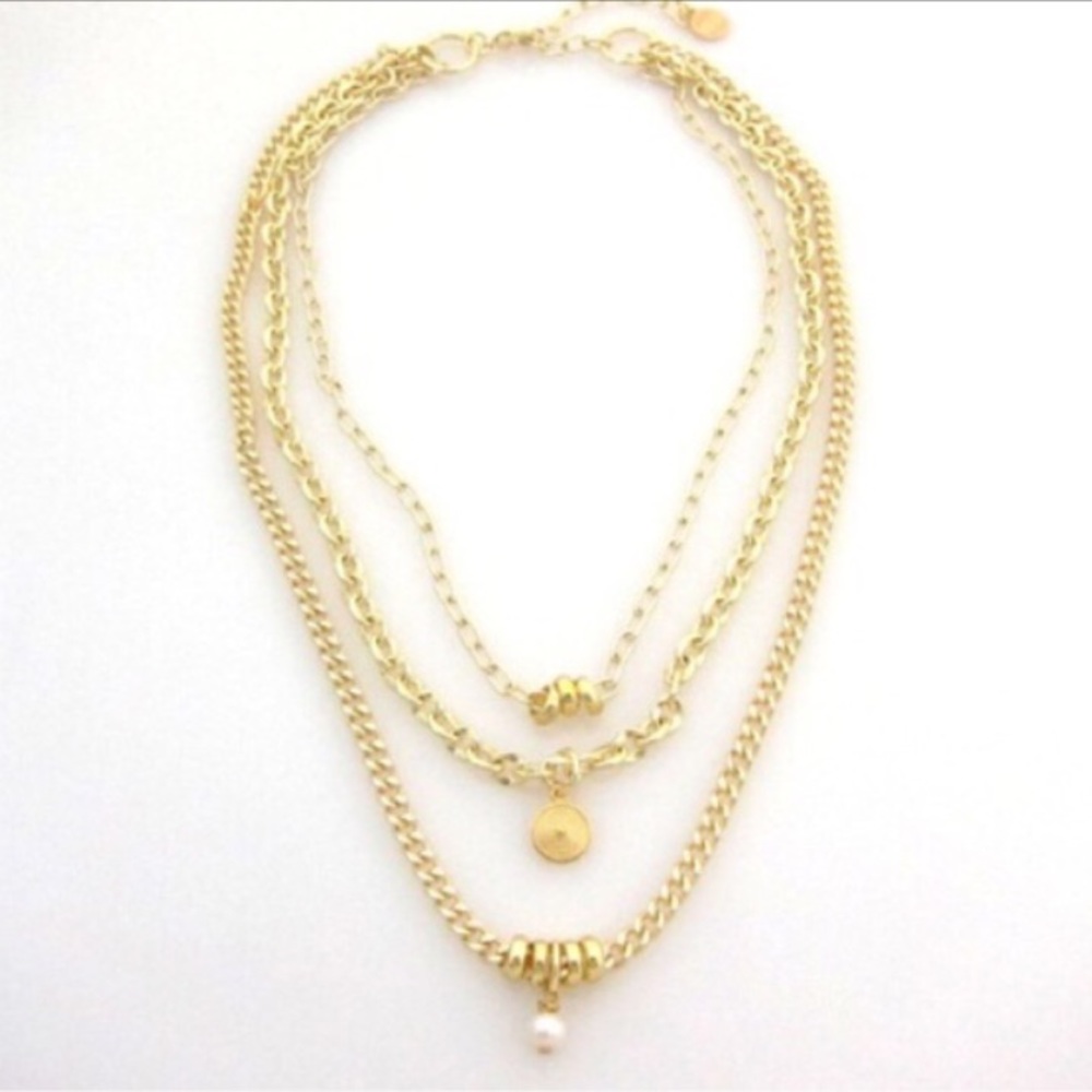Gold plated tri necklace.
