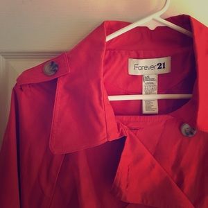 Orange poncho-style jacket