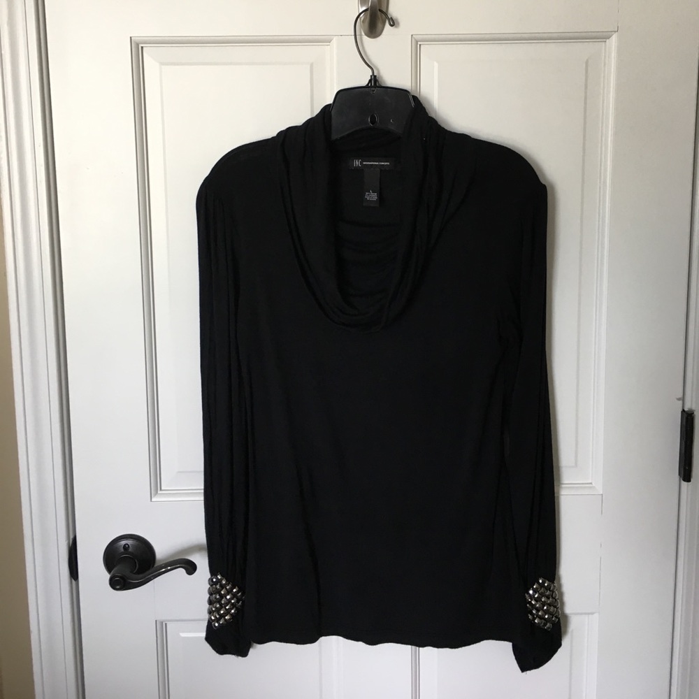 Black top with embellished sleeves!