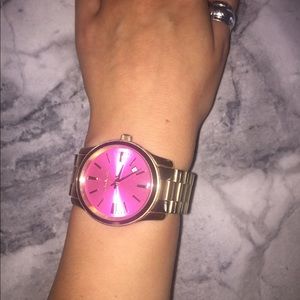 Gold MK watch with pink face