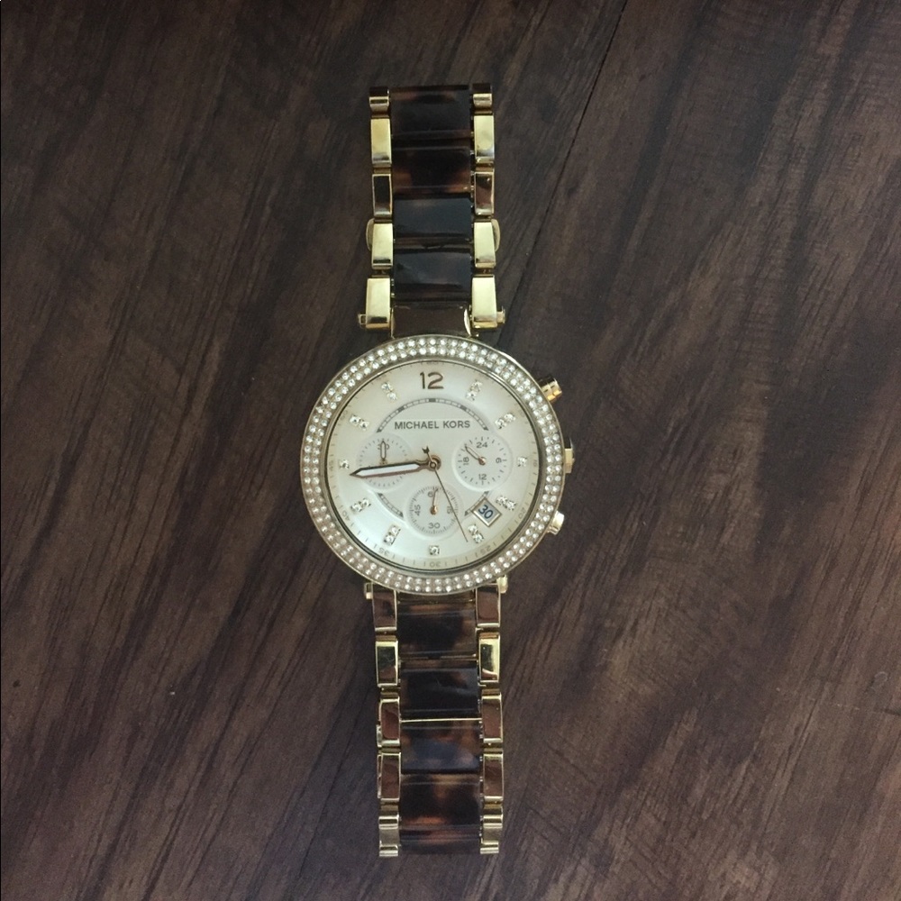 MK gold and tortoise watch