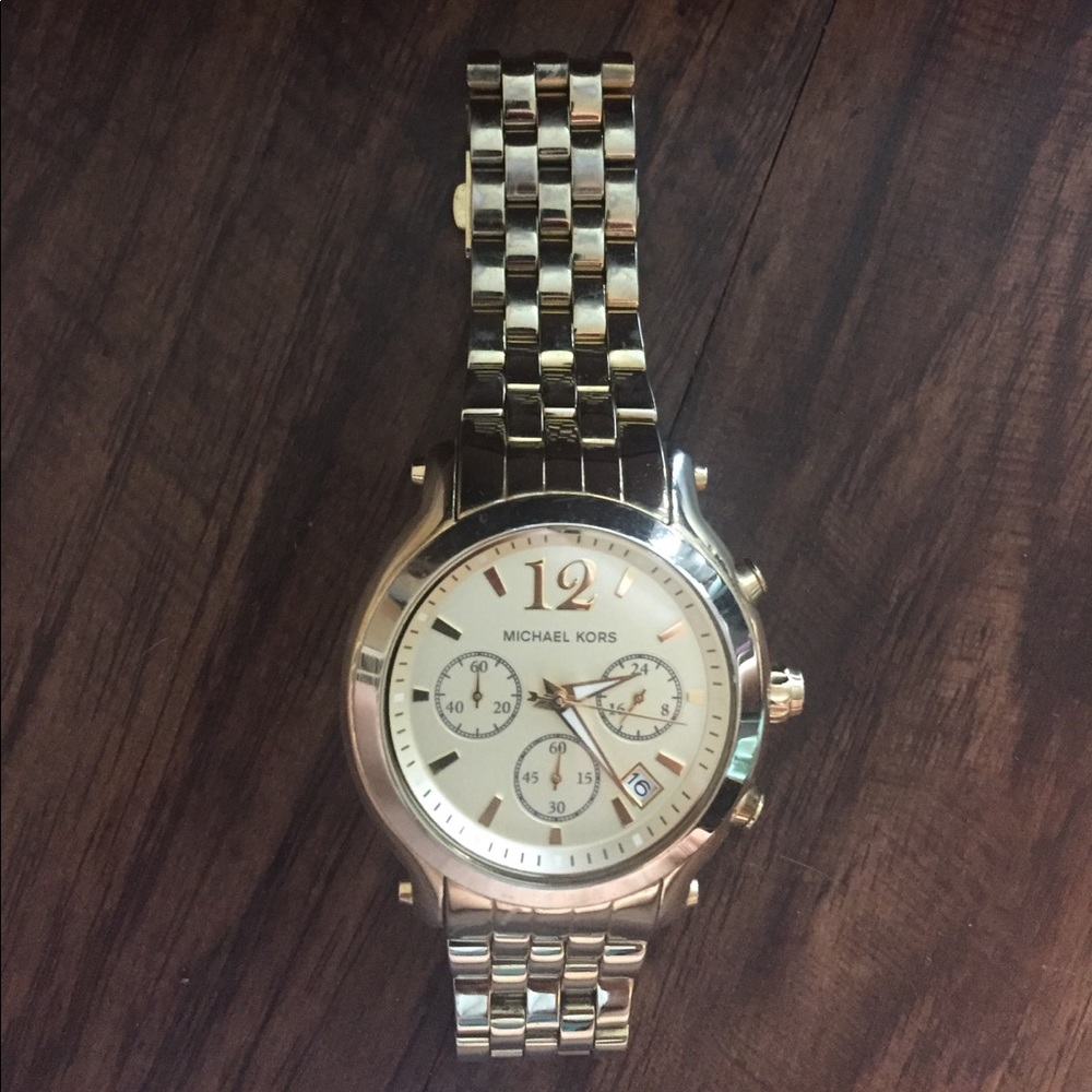 Gold MK watch