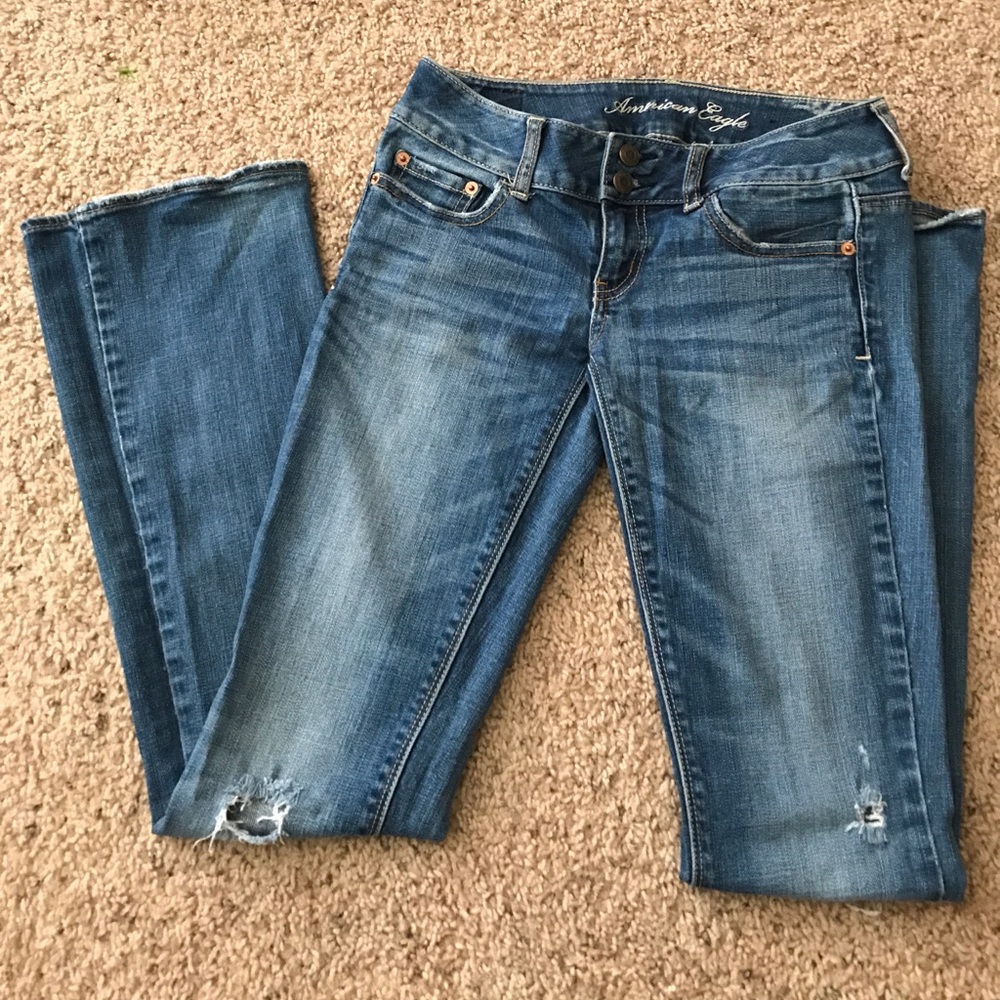 Medium wash jeans, artist.