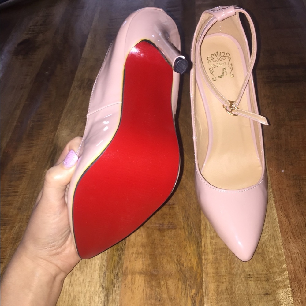 Brand new nude heels with red bottoms.