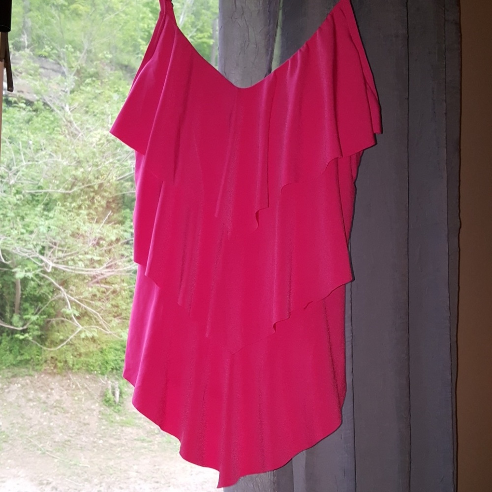 Magic Suit swim top. Makes you look thinner.
