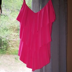 Magic Suit swim top. Makes you look thinner.