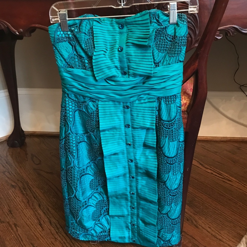 Mini strapless party dress.