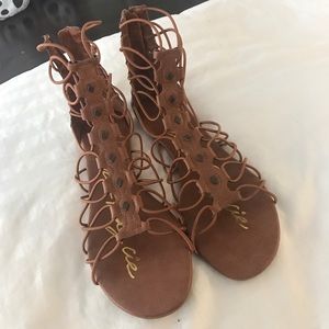 Brown criss-crossed sandals