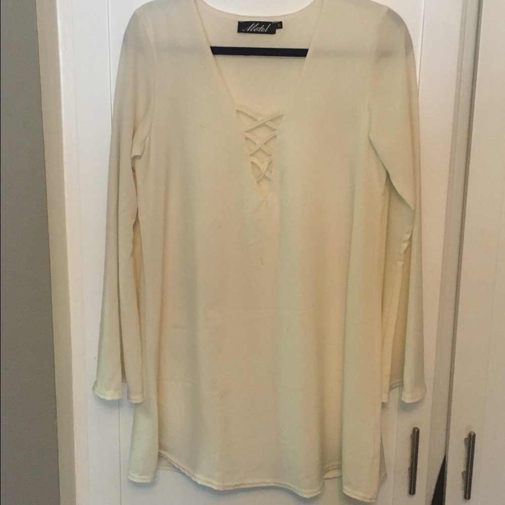 Long sleeved White boutique dress