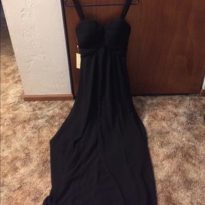 Black formal gown. NWT. Zippered back. Size 2.