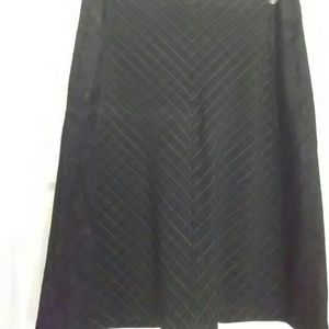 Pinstripe knee-length skirt w/ lace.