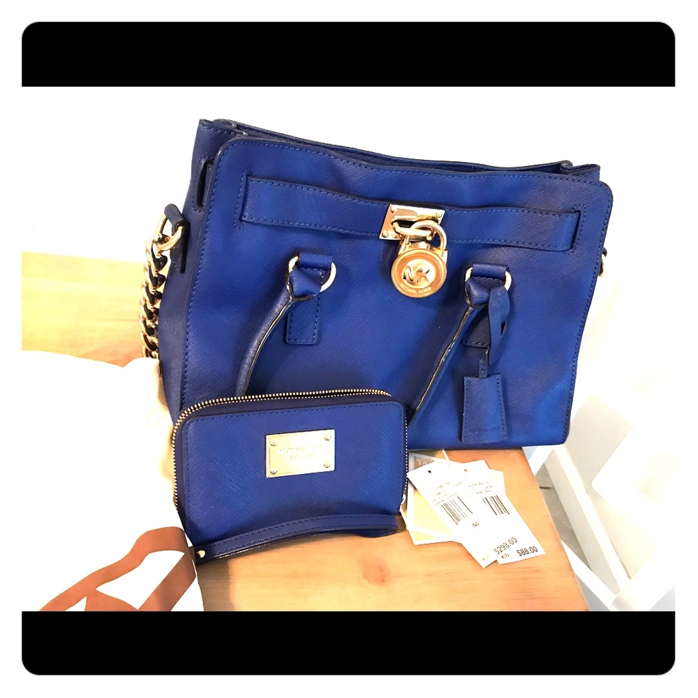 NOT FOR SALE*****Michael Kors gold chain with Wristlet