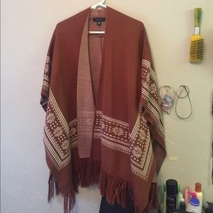 Burnt orange poncho
