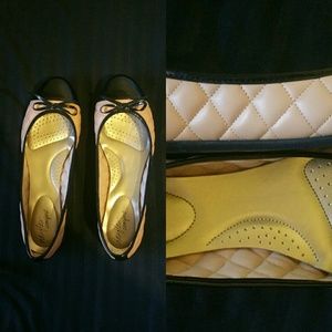 Pink and black flats