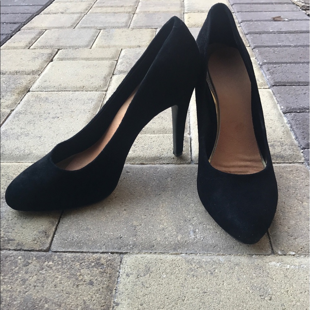 Black suede pumps
