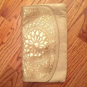 Melie gold clutch