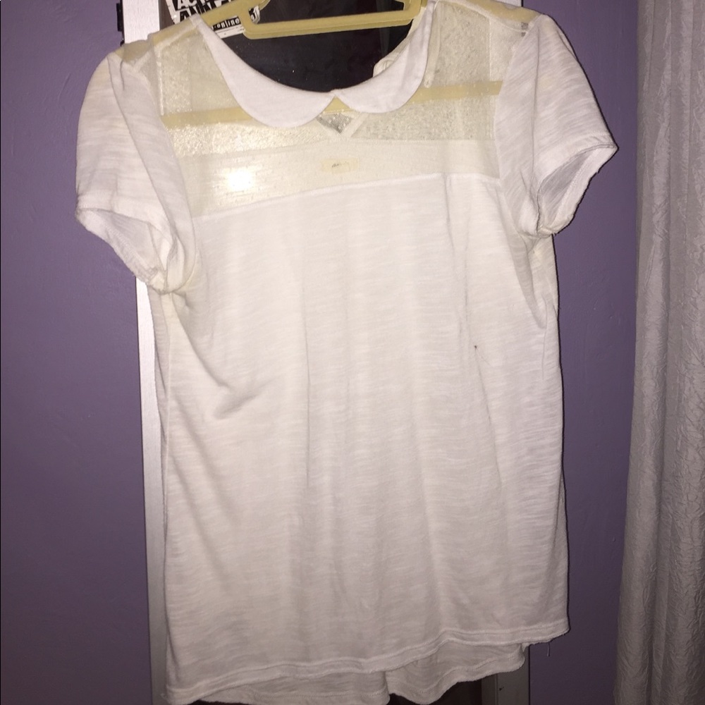 white collared shirt with see through top part