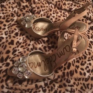 Tan slingbacks with rhinestone details