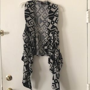 Grey and black open front waterfall hang vest.