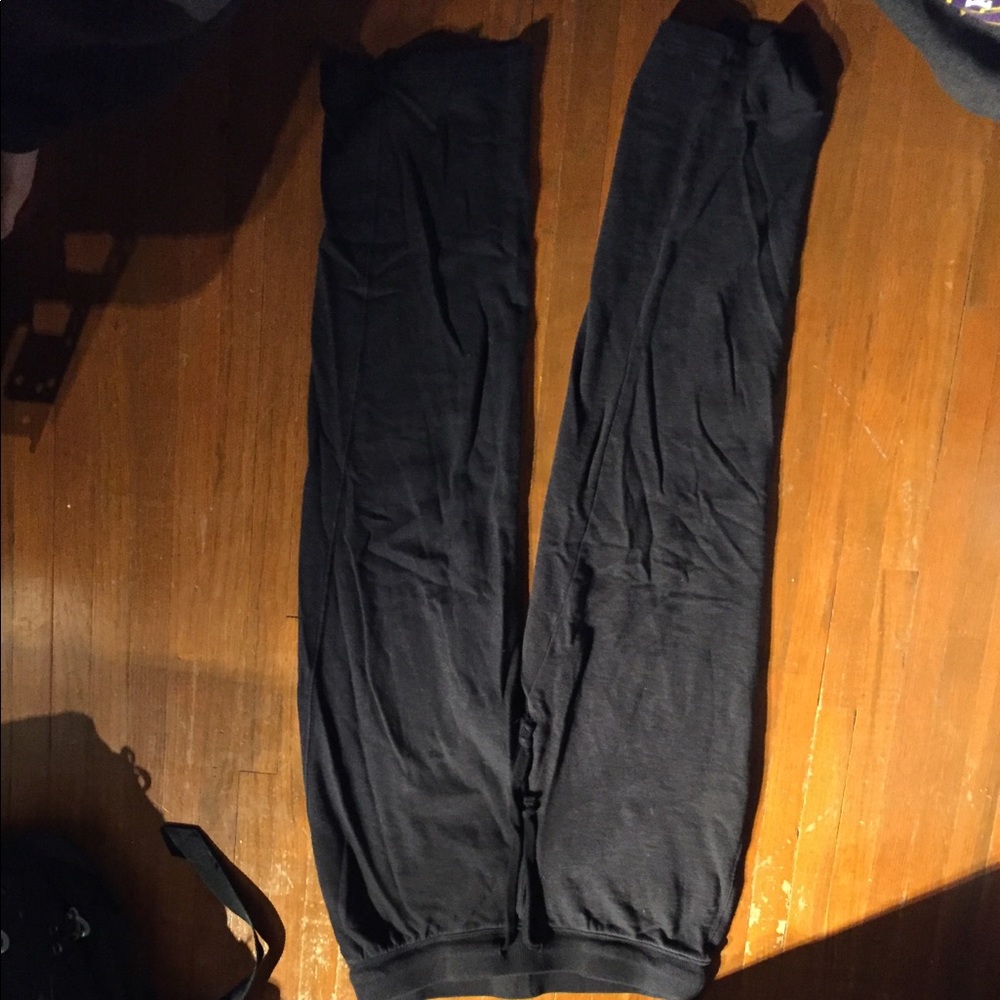 Black sweatpants with pockets on the back.