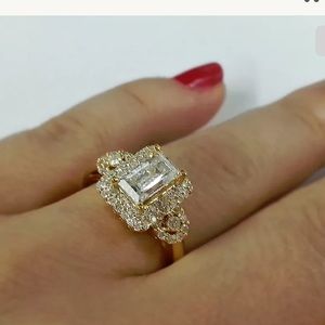 A 1.55 Twt Emerald Cut Diamond With .55cts GIA