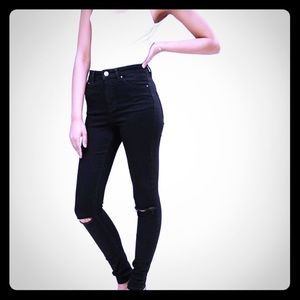 High waisted skinny jeans with ripped knees