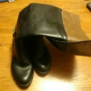 Black and brown tall boot.