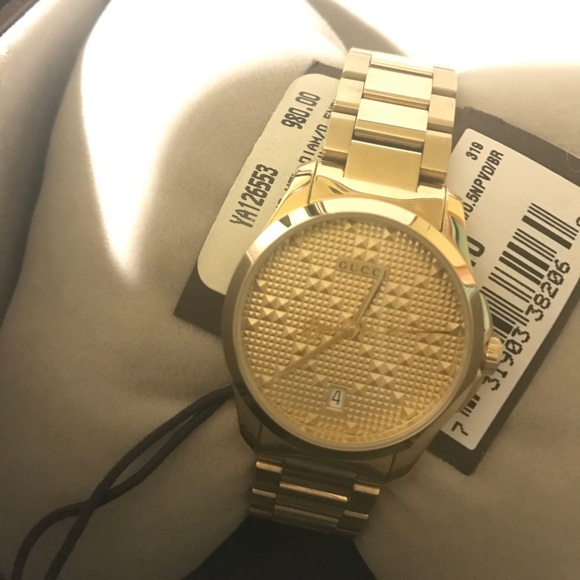 Gucci gold watch