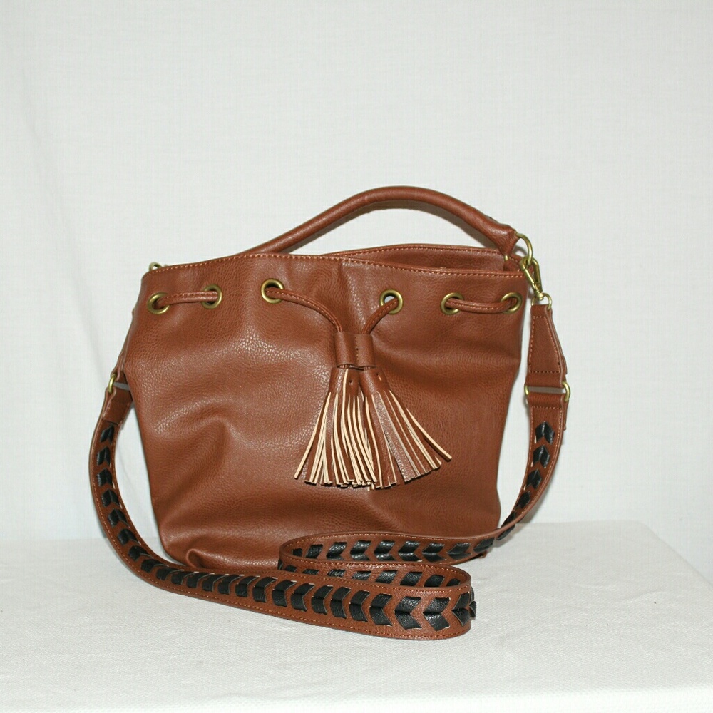 Carlos Libra Cross Body Drawstring Bag.