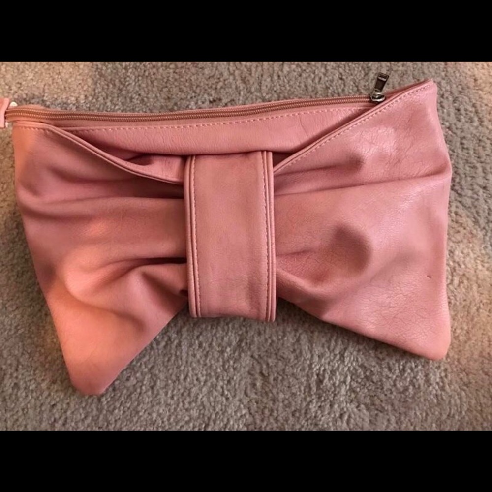 Pink bow clutch