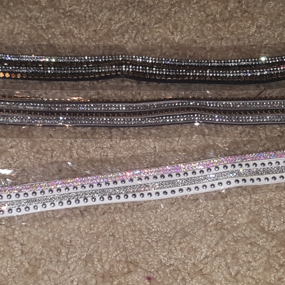 3 different bracelets black silver white