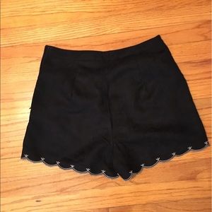 Black high waisted shorts with scalloped trim