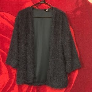 Soft green cardigan.