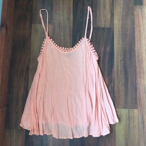 Peach tank with cute detail
