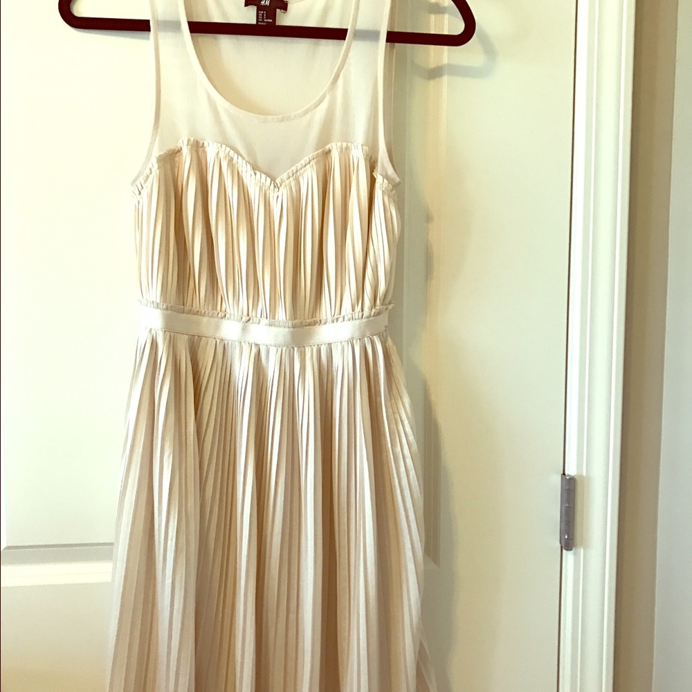 Elegant chiffon cream dress.