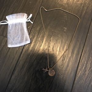 Copper necklace with bird charm and "fly" charm