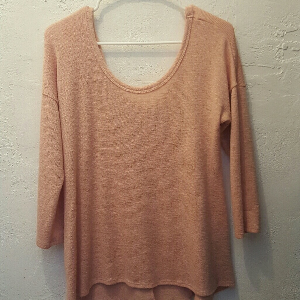 Flowy 3/4 sleeve blouse with bow on the back