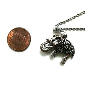 Silver elephant pendant.