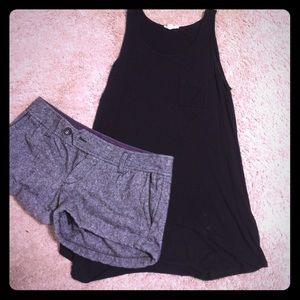 Black tank with pocket and gray shorts