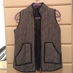 Black and white zip up vest