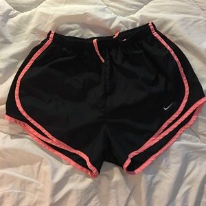 Black and bright flamingo Nike running shorts Sz M