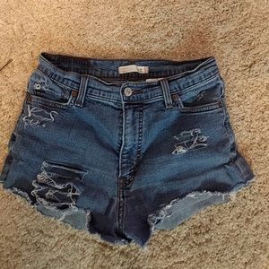 High waisted distressed Levi's