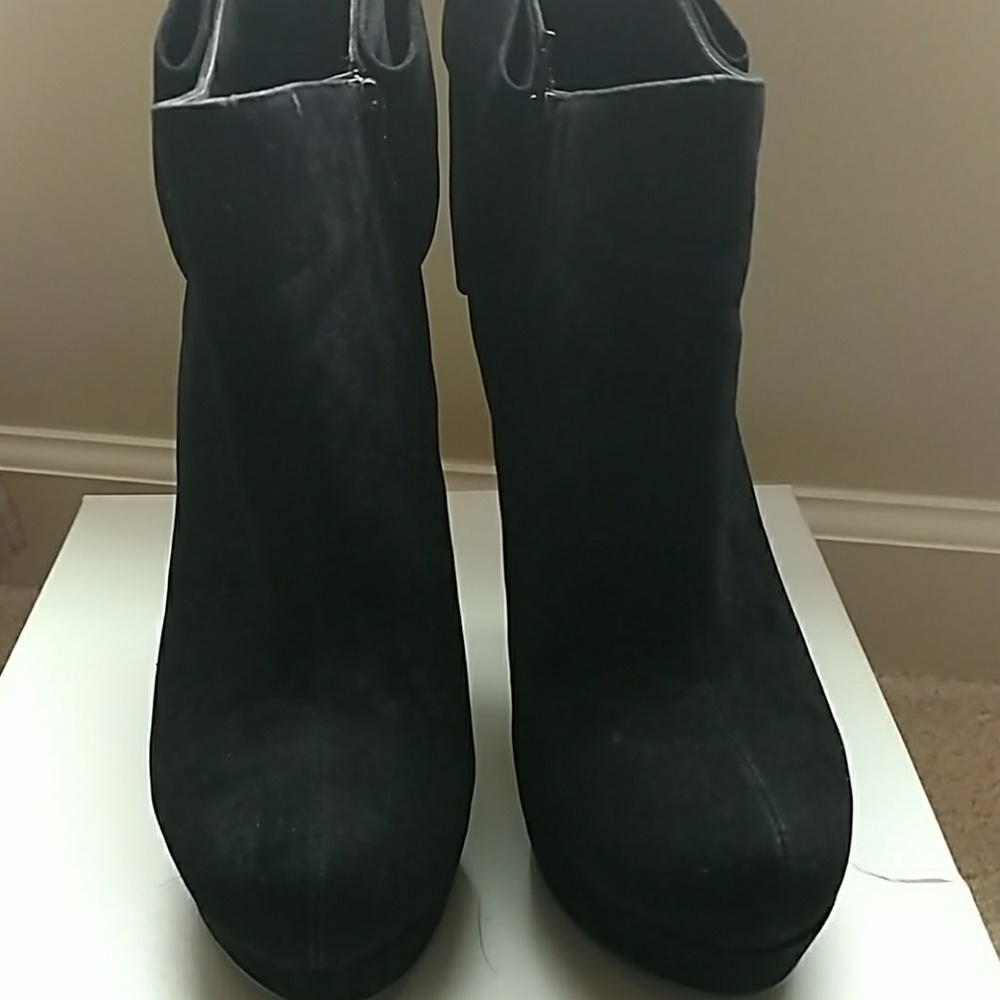 Black booties with large bow back