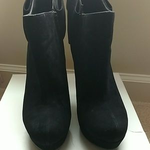 Black booties with large bow back