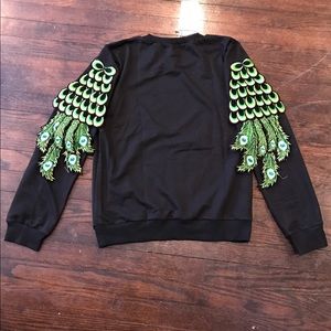 Peacock sleeve styled sweatshirt
