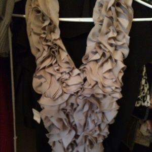 Designer top. Backless with side boning